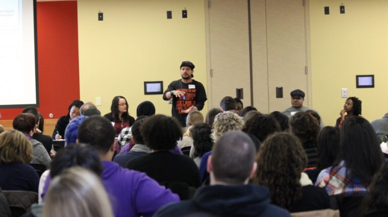 A speaker addresses a full room at the CCDE’s #BlackLivesMatter Teach-In