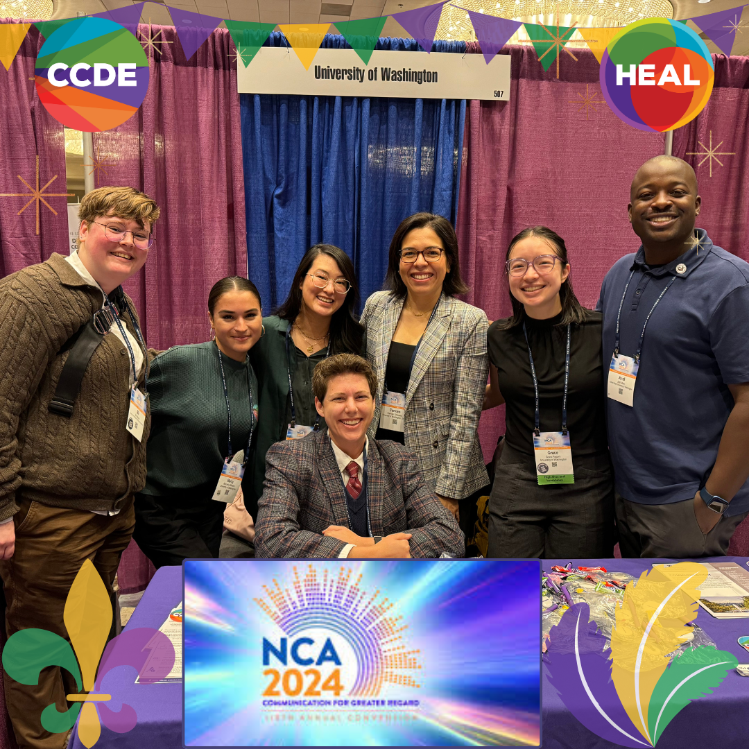 CCDE and HEAL students and faculty gathered in front of a colorful backdrop at the NCA conference