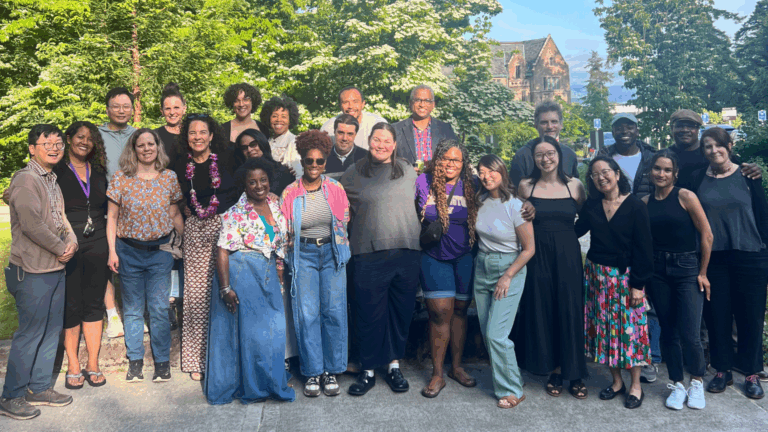 CCDE students, faculty, staff, and community members gathered outdoors for a group photo