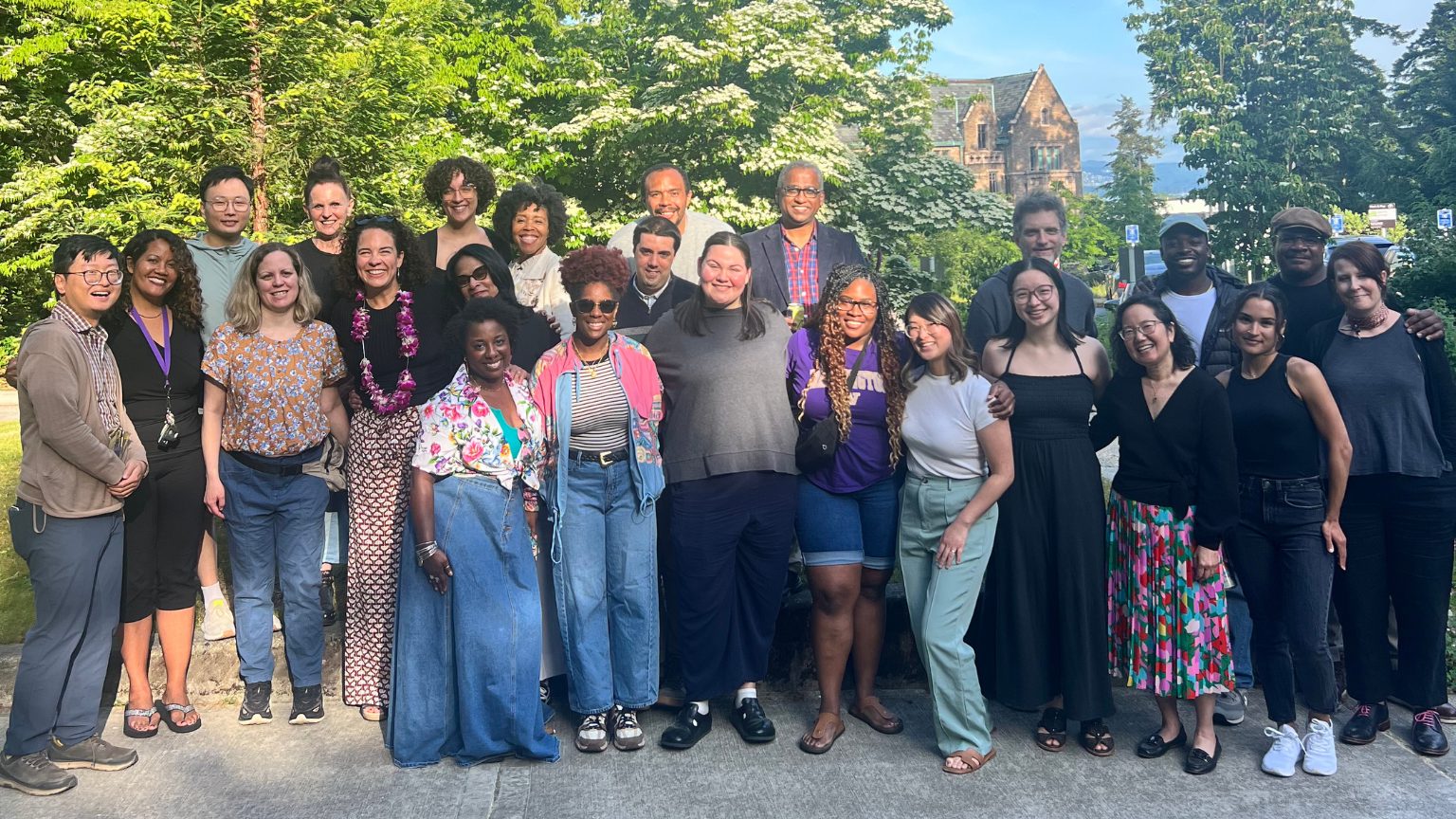 CCDE students, faculty, staff, and community members gathered outdoors for a group photo at the CCDE’s 10-year celebration
